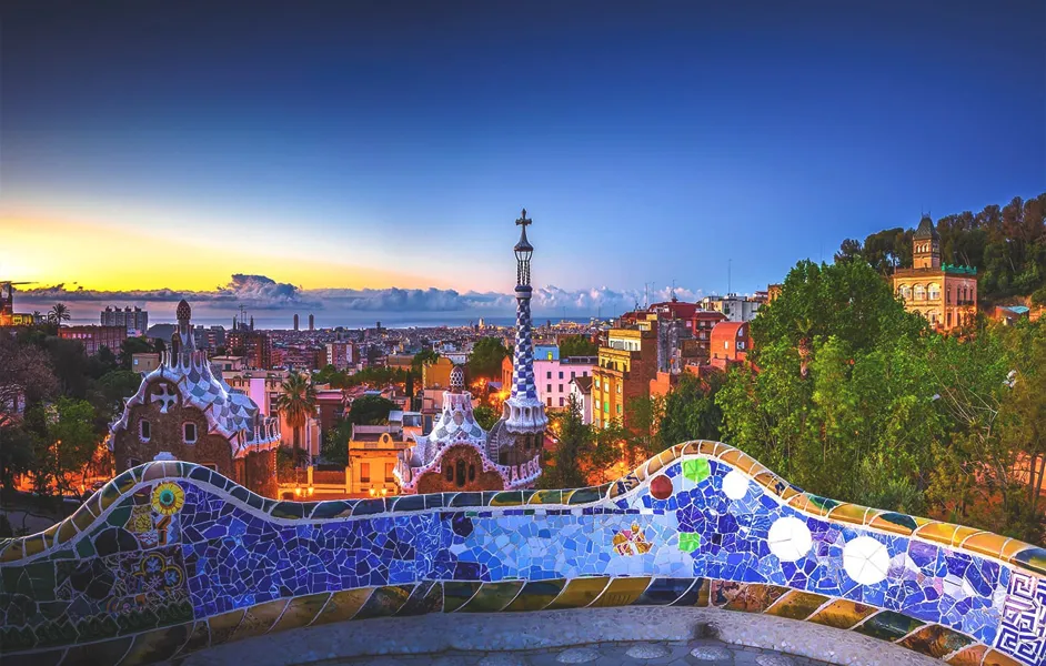 Park Güell mosaics with city skyline
